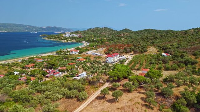 Aerial View of Paralia Glastri Beach and Coastal Villas, Greece