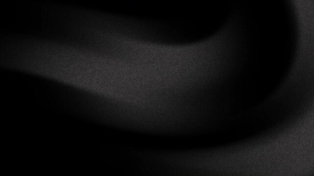 Grainy dark black and gray abstract texture suitable for backgrounds, web design, print materials, or digital art creations. Trendy and versatile.