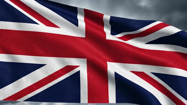 Two-frame close-up of the Union Jack flag waving against a dramatic stormy sky, detailed red, white and blue fabric folds and texture captured from first to last video frame