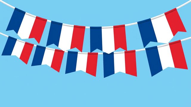 Celebratory French flag bunting strung across a clear blue sky for Bastille Day festivities and national pride
