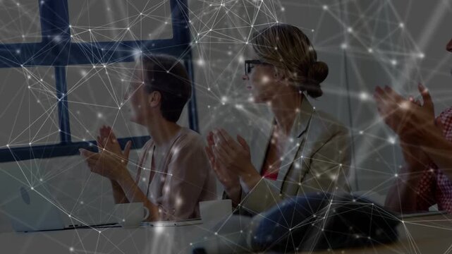 Team turning toward speaker and clapping at business meeting, mesh overlay drifting obscuring faces