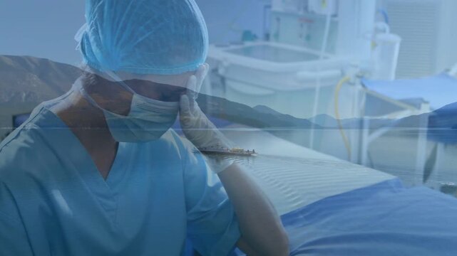 Female medic prepping surgery, adjusting cap or mask, clasping gloves as boat overlay centering on b