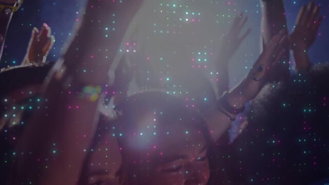 Concert crowd responding to music drop and light pulse, raising hands with pixel sparkle overlay