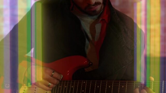 Guitarist plucking fretting, camera pulling out, red guitar and glitch bands pulsing for music