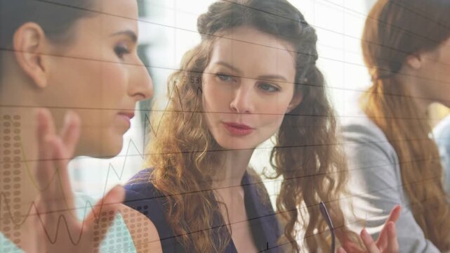 Center woman turning to left woman, starting data talk, graphs overlaying, third woman staying idle