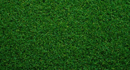 Fototapeta premium Synthetic turf with vibrant green color and lush dense grass texture background