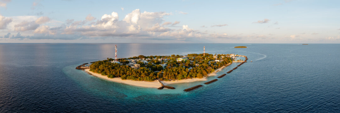 Aerial panoramic view of Kendhoo island at sunset, Baa Atoll, Maldives