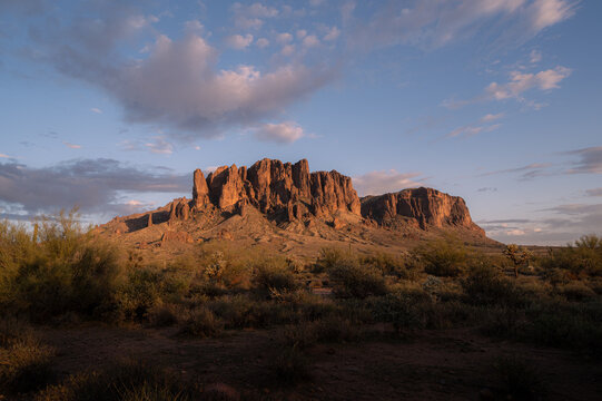 Scenic view of Superstition mountains at sunset in Lost Dutchman park, travel and tourism concept. Copy space banner