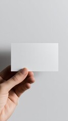 Obraz premium Hand Holding Blank Business Card