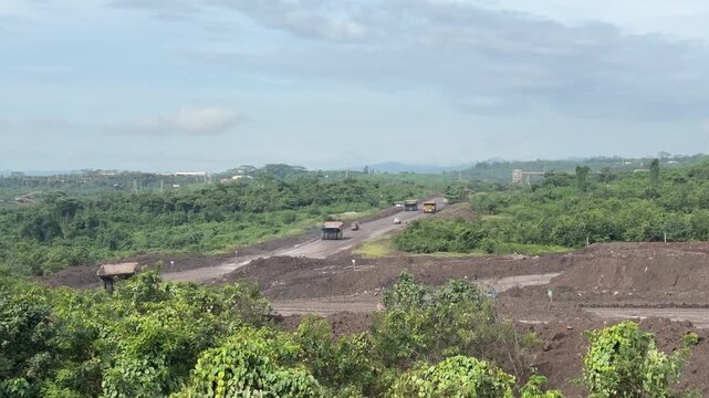 Wide View of Open-Pit Coal Mine Logistics and Haul Road Traffic