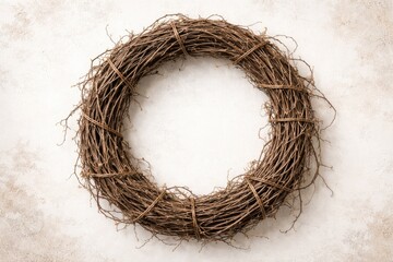 Fototapeta premium Rustic grapevine wreath crafted from dried twigs for natural home decor on white background