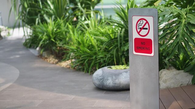 No smoking sign in a garden path area