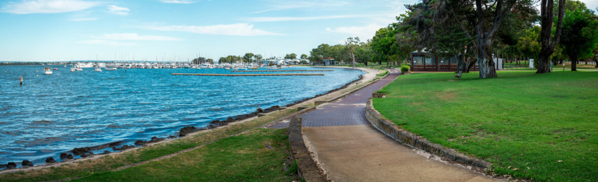 Waterfront Park Walkway Along Calm Marina With Boats, Trees and Grassy Promenade in Matilda Bay, Perth, Australia, 2 February 2022