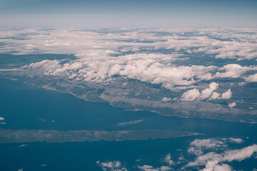 Snowy island landscape. Remote icy mountain chain. Calm ocean scene with snowy peaks © VolodymyrNadtochii
