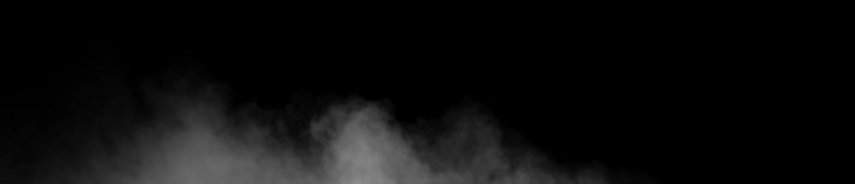 The smoke floated lightly over the floor surface. The steam rises gently. Stage smoke effect coating or for isolated product advertising on a black background.