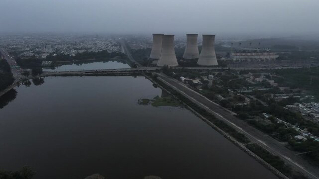 Aerial View of Thermal Power Plant Cooling Towers and Lake in Bathinda Punjab.