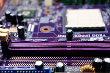 The central part of the printed circuit board of a computer motherboard © Alexander