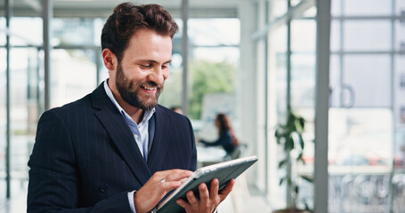 Fototapeta premium Smile, trader and man in office, tablet for investment deal and signature for online contract. Person, investor and employee in workplace, profit growth and tech for trading portfolio and internet