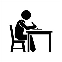 Fototapeta premium Dedicated Person Sitting at Desk Engaged in Writing and Studying Activity
