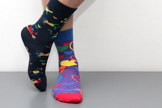 Mismatched socks to commemorate World Down Syndrome Day, raising awareness about diversity and inclusion, symbolizing differences