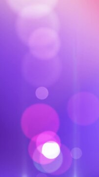 Soft gradient background with glowing bokeh lights in vertical format. Ideal for mobile UI
