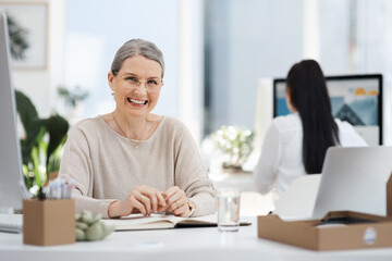 Obraz premium Portrait, business and mature woman in office with book, author or creative professional with pride. Smile, writer and confident person with journal for coworking, about us or manager with experience