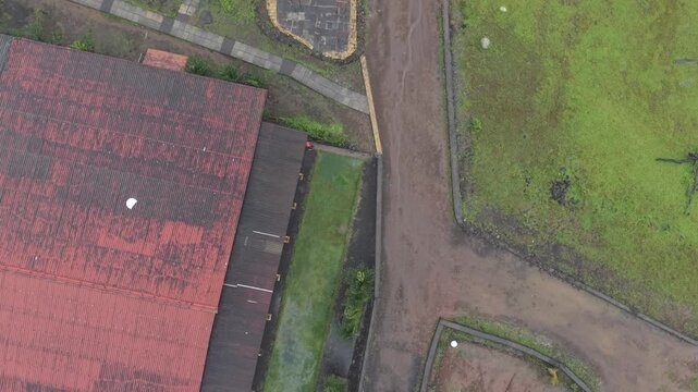 Aerial Drone View of Bhandardara Landscape with Green Valley River and Monsoon Clouds Maharashtra India