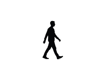Obraz premium A solitary man is captured walking forward in a striking dark silhouette