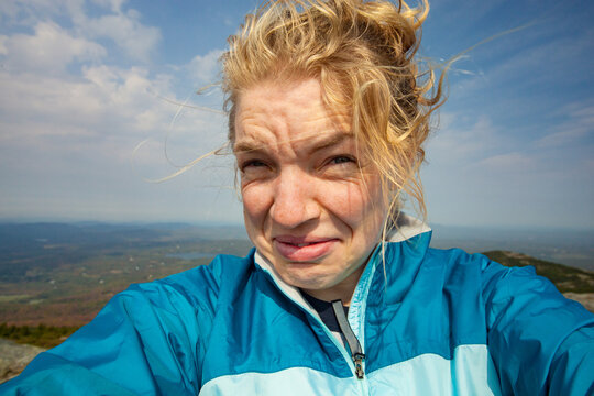 Selfie of a young blond caucasian woman atop Mount Monadnock