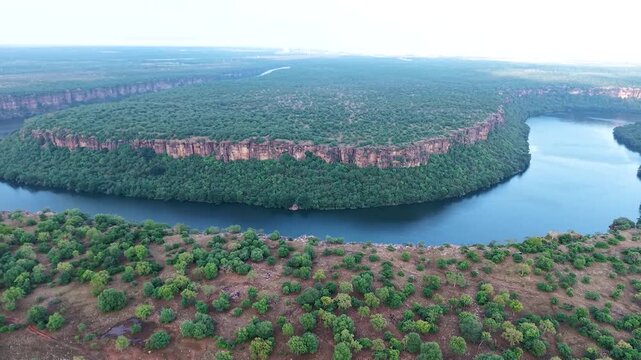 Aerial drone shot of Jawahar Sagar Sanctuary along Chambal River in Rajasthan India, showcasing natural landscape, river flow and protected wildlife habitat.