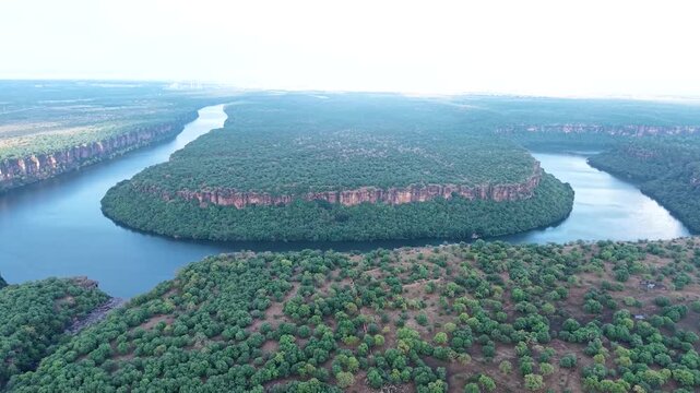 Aerial drone shot of Jawahar Sagar Sanctuary along Chambal River in Rajasthan India, showcasing natural landscape, river flow and protected wildlife habitat.