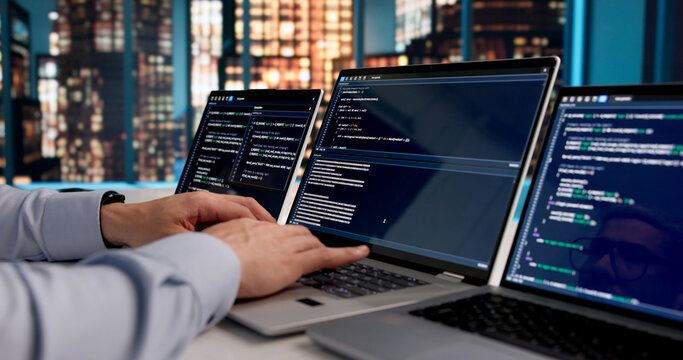 Dedicated Software Developer Immersed In Coding Web Applications