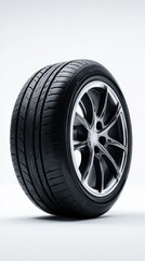 Obraz premium High performance car tire with alloy rim for automotive enthusiasts and professionals