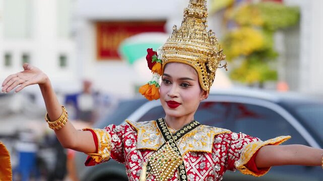 Traditional Thai Khon Dancer Performs in Front of Wat Suthat Temple