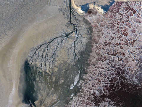 Strange Patterns in Evaporation Ponds in Industrial Wasteland in