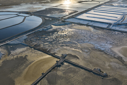 Strange Patterns in Evaporation Ponds in Industrial Wasteland in