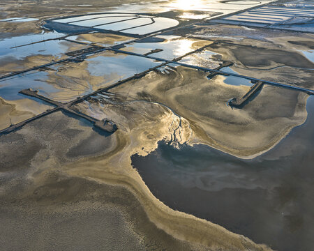 Strange Patterns in Evaporation Ponds in Industrial Wasteland in
