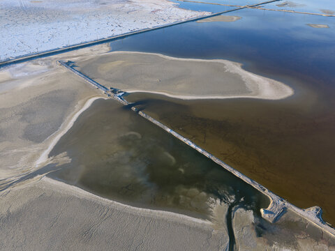 Strange Patterns in Evaporation Ponds in Industrial Wasteland in