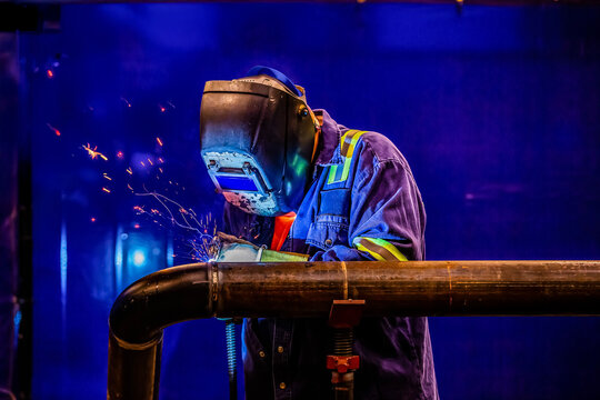 Welder at refinery in Chicago
