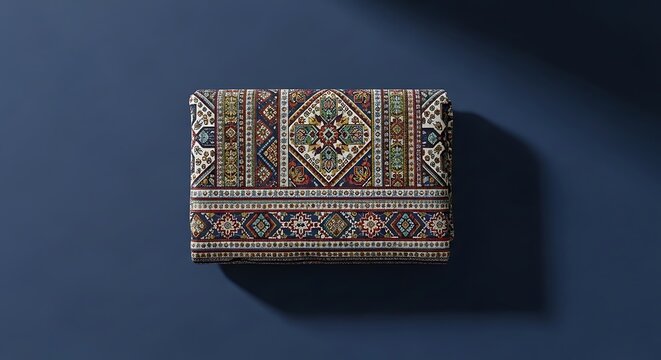 Traditional Assyrian patterned fabric folded neatly