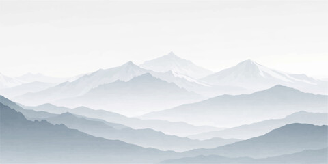 Snowy mountain peaks pierce through a misty winter landscape at sunrise where clouds and fog settle over the alpine valley range © BIBI