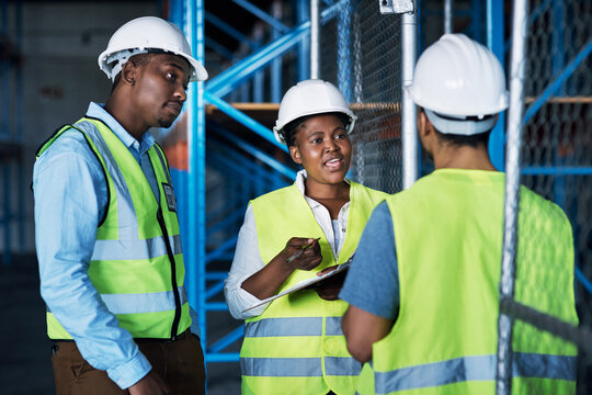 Business people, discussion and team with clipboard for quality control or storage maintenance. Group, employees or contractors with checklist, idea or collaboration for freight safety or improvement
