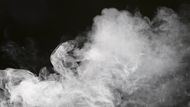 Delicate white smoke curls and wisps flowing across a deep black background, creating abstract, fluid patterns with strong contrast and ample copy space