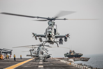 STRAIT OF HORMUZ U.S. Navy and Coast Guard ships participates in a photo exercise while transiting the Strait of Hormuz,  Sioux City is deployed to the U.S. 5th Fleet area of operations to help ensure © Mubin
