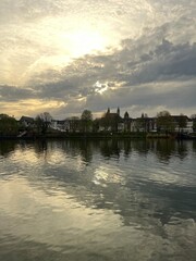 Naklejka premium sunset over the river