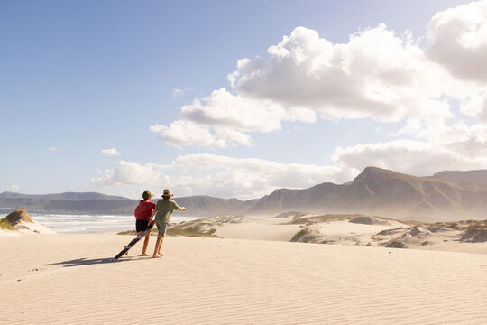 family walking beach, Vilankulos, Mozambique, Africa