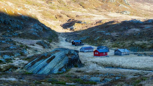 Old Agricultural Buildings by the River at Kleivaslette in Beautiful Herredalen Valley in Vang Municipality, Valdres, Norway