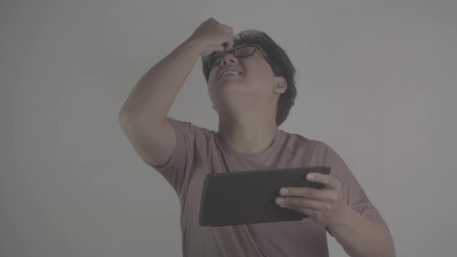 Southeast Asians watch football on their tablets, then get frustrated and annoyed when the opposing team scores goal S-Log3, S-Gamut3.Cine