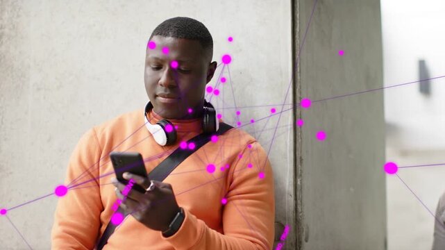 Man tapping phone and sending 2FA for security, senior approaching while magenta nodes linking both