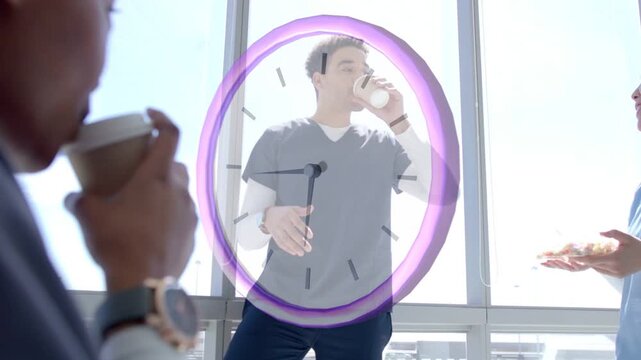 Male medic joining break, sipping coffee, gesturing while purple clock appearing over subject